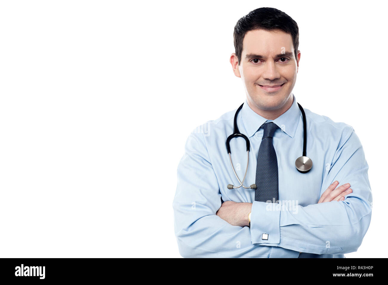 Senior smiling male doctor at work Stock Photo - Alamy