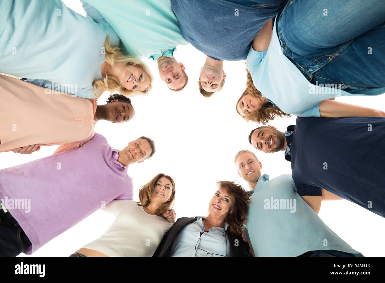 Portrait Of Creative Business People Standing In Huddle Stock Photo - Alamy