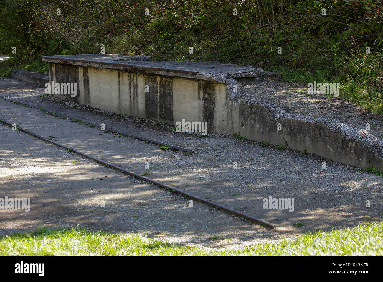 Within the boundary of Dachau Concentration Camp in Germany, viewed here is the end of the line for many undeserving innocent people. Stock Photo