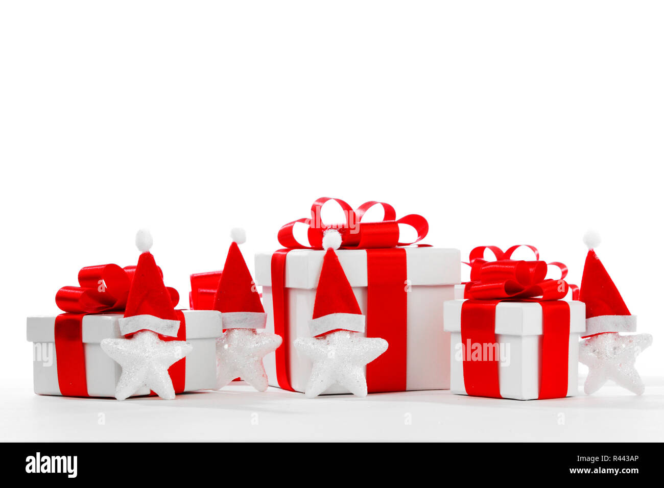 Gift boxes with santa claus stars isolated on white background Stock ...