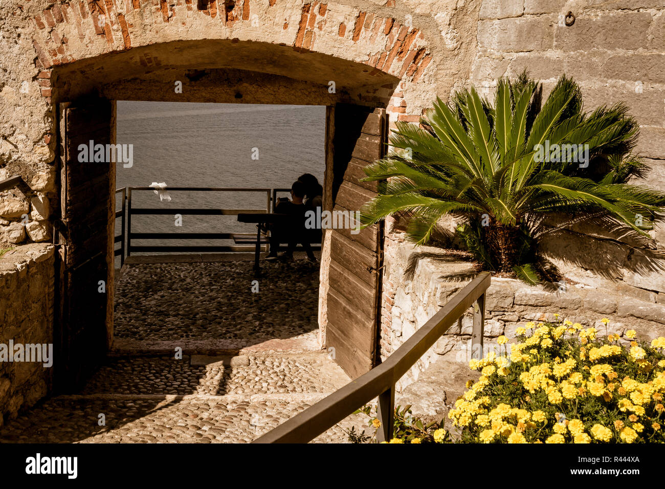 The medieval Scaliger Castle in Malcesine on Garda lake, Verona, Italy.The old Scaliger Castle is one of the top tourist attractions Stock Photo