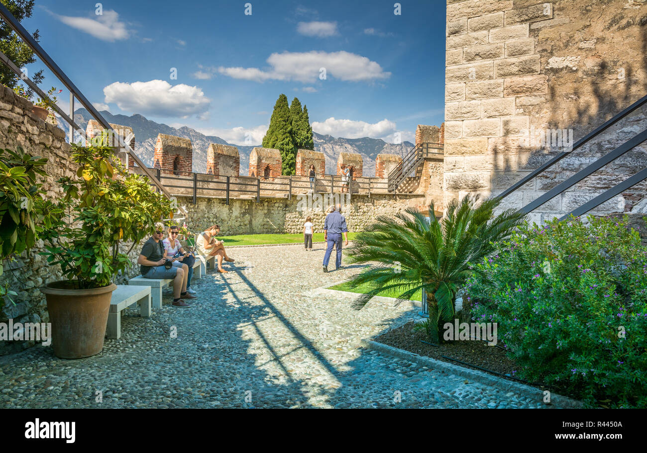 The medieval Scaliger Castle in Malcesine on Garda lake, Verona, Italy.The old Scaliger Castle is one of the top tourist attractions Stock Photo