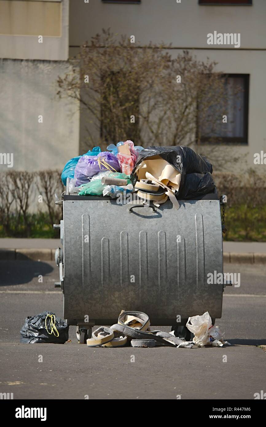 Overflowing Rag Container Garbage Containers Full, Overflowing Stock Photo - Alamy