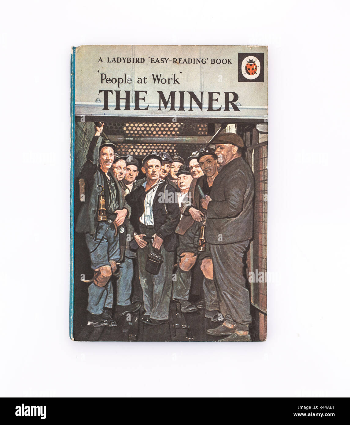 SWINDON, UK - NOVEMBER 18, 2018:  The Miner Ladybird book from the People at work series,  A LADYBIRD Easy-Reading Book on a white background Stock Photo