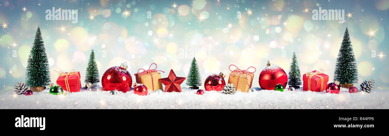 Christmas Vintage Background - Gifts And Tree On Snow With Shiny Background Stock Photo
