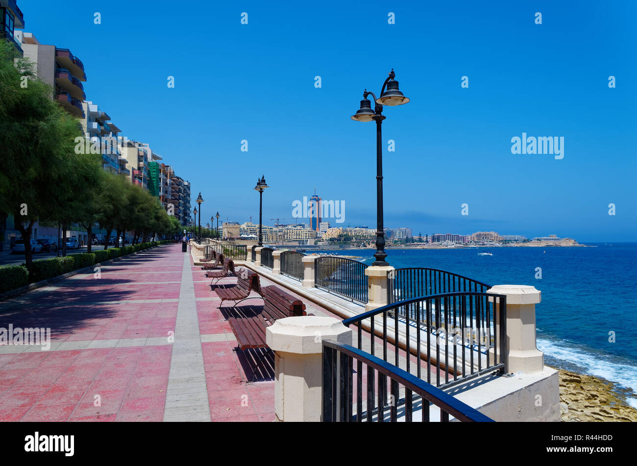 Promenade street in Sliema city on Malta. The street is called 'Ix - Xatt Ta' Qui - Si - Sana' Stock Photo