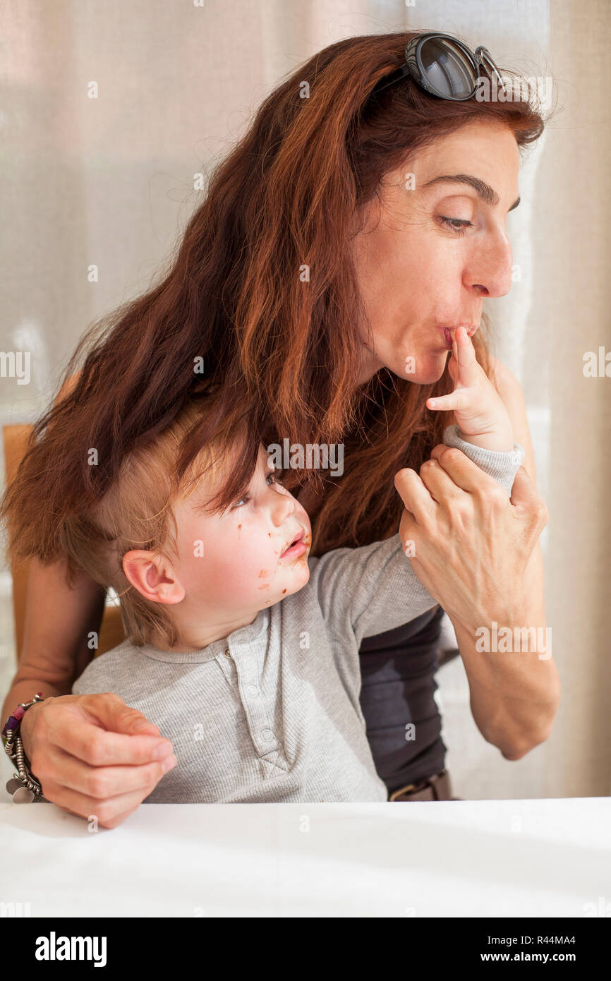 Baby suck mother finger hi-res stock photography and images - Alamy