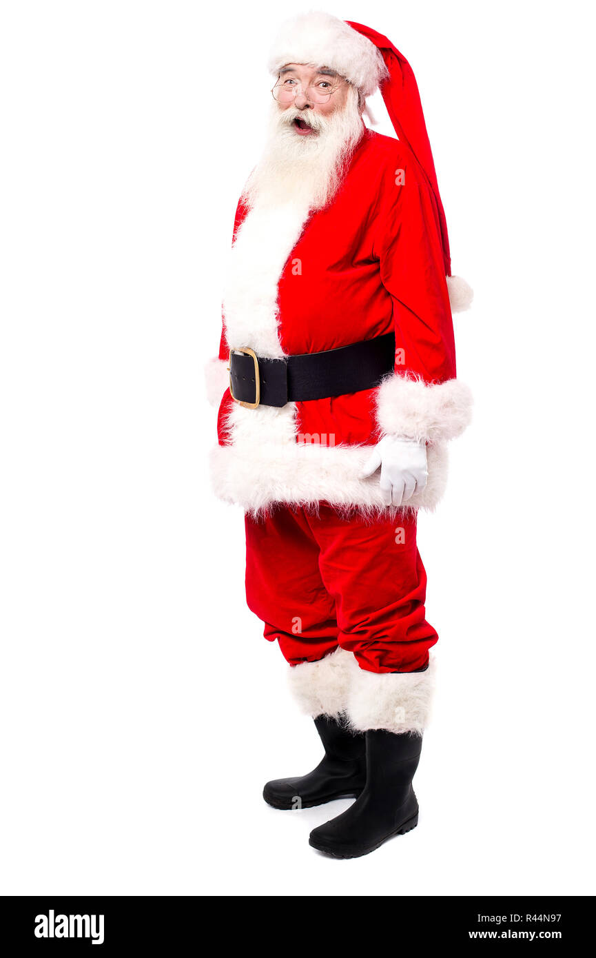 Old man in santa dress posing over white Stock Photo