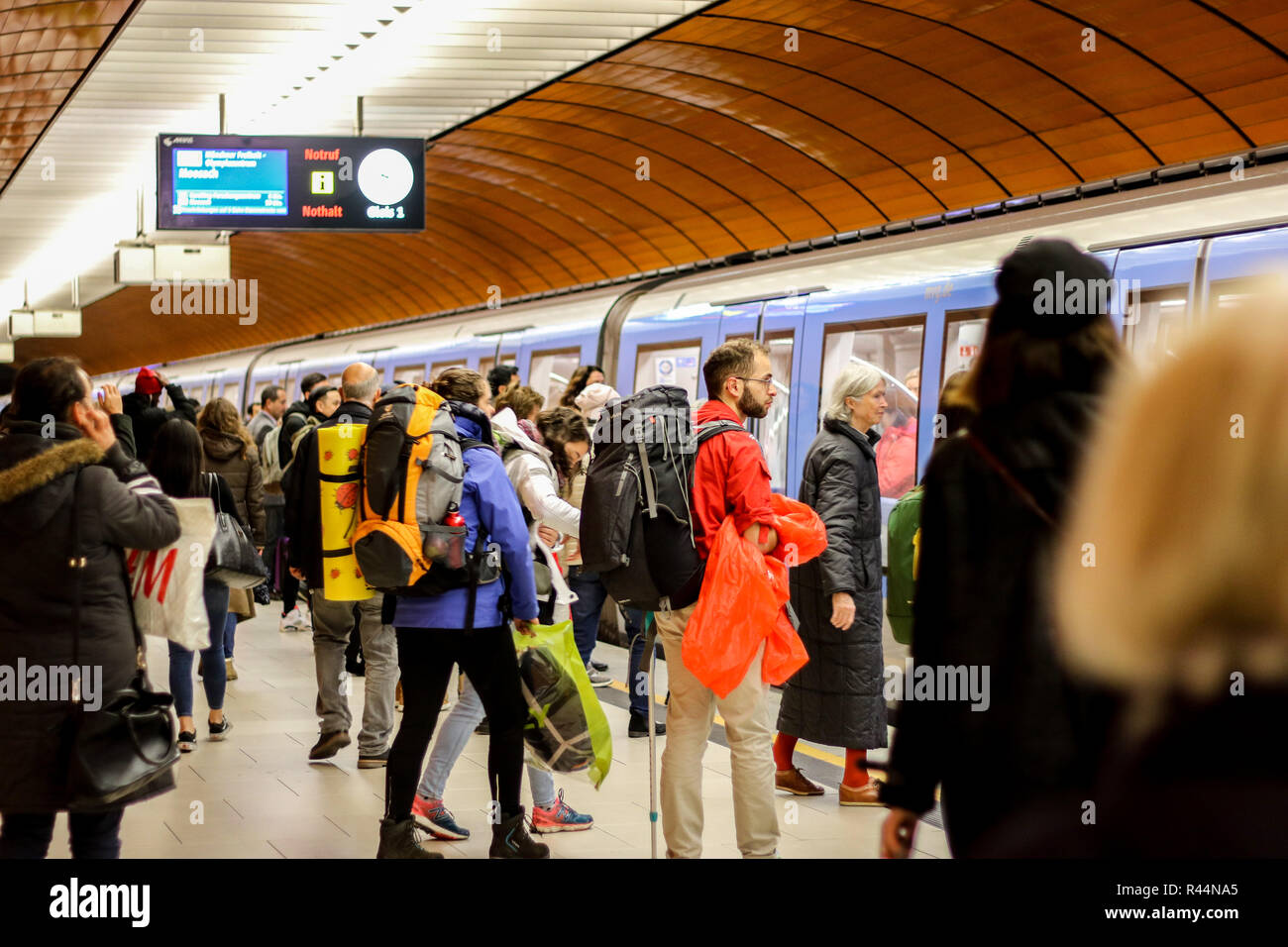 Marienplatz U-bahn station, platform, Munich, Germany, commuters passengers alighting, rush hour concept, underground subway, modern public transport Stock Photo