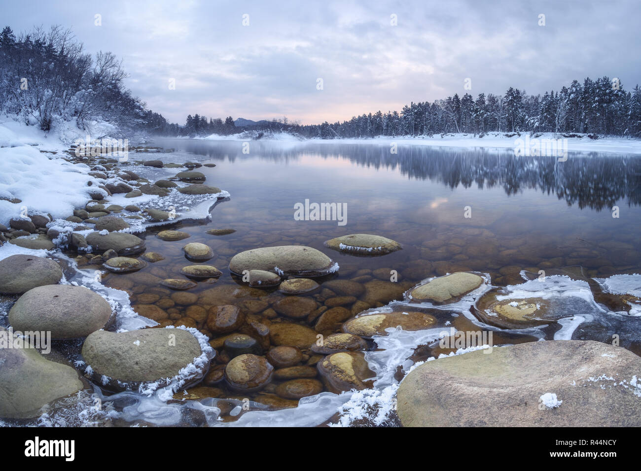 Coast winter river, Lebed (Swan) river, near the village Turochak, Altai Mountains, Siberia, Russia Stock Photo