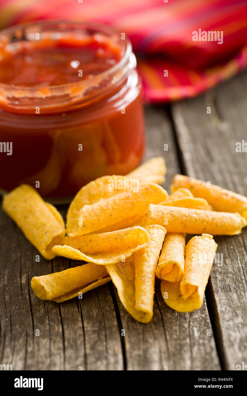 rolled nacho chips and salsa dip Stock Photo Alamy