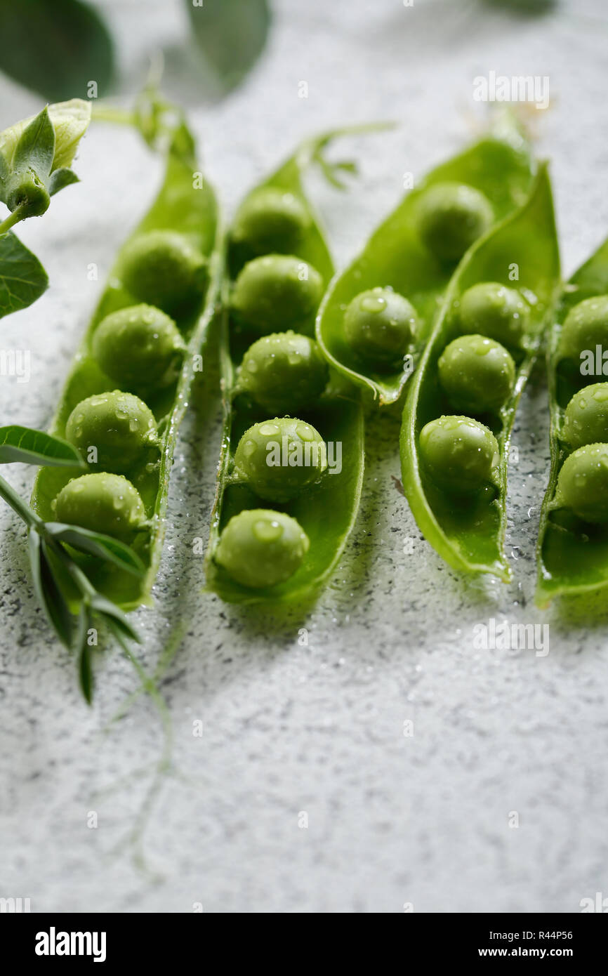 Background with green peas pods Stock Photo - Alamy