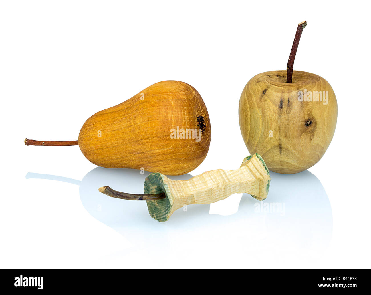 Wooden apple, apple stub and pear made from a different types of wood