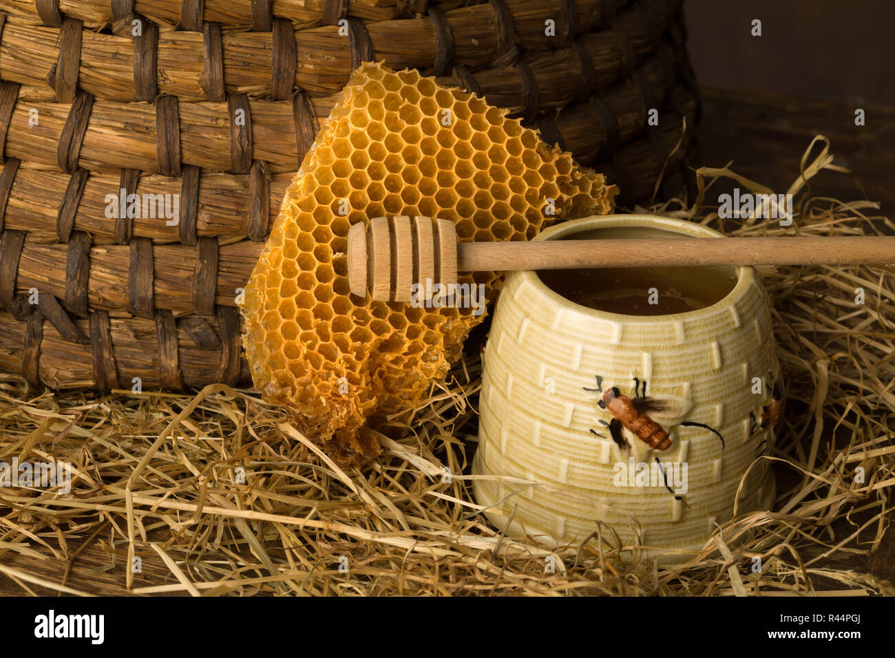 Vintage old beehive basket still life Stock Photo - Alamy