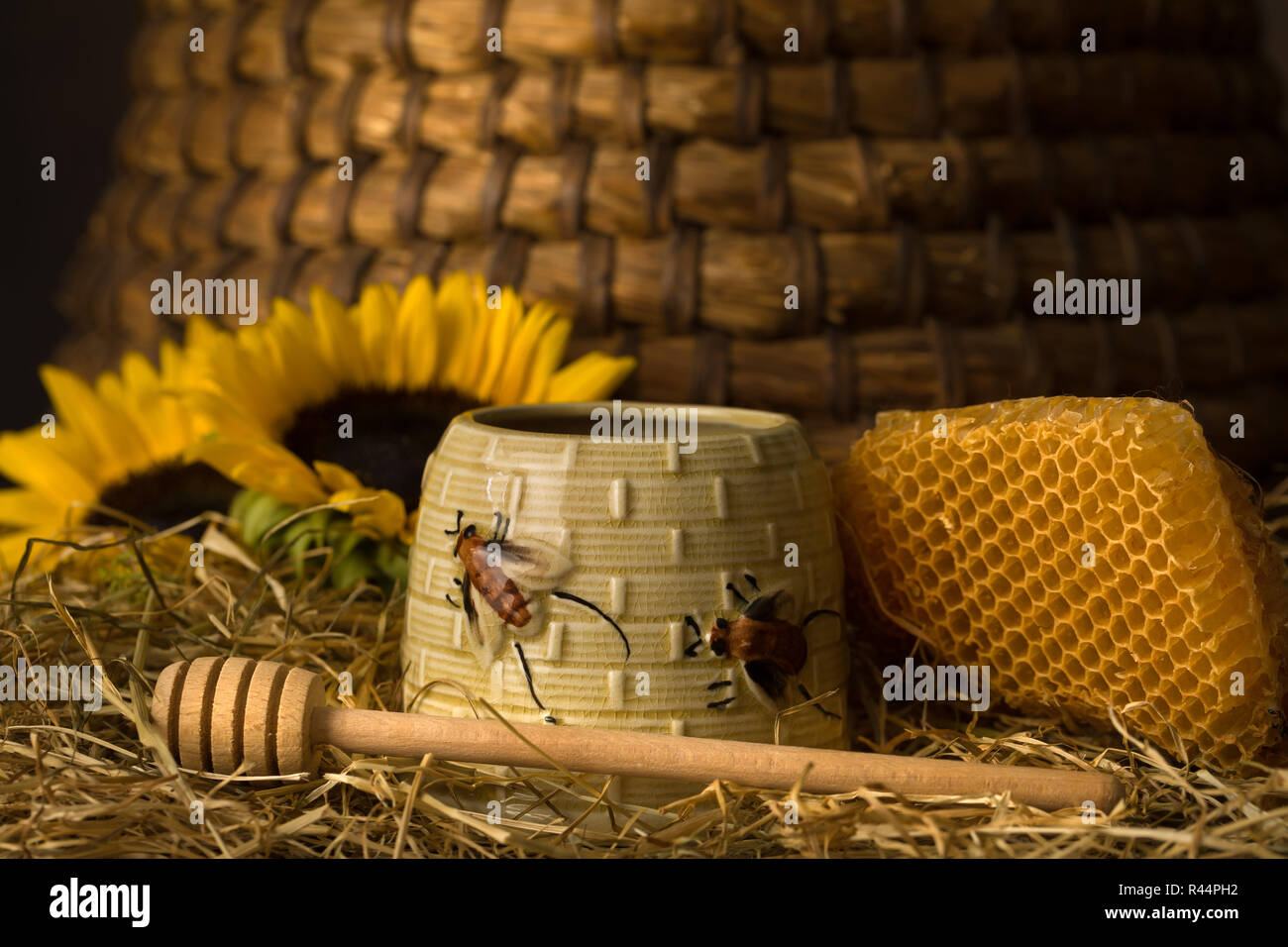 Vintage old beehive basket still life Stock Photo - Alamy
