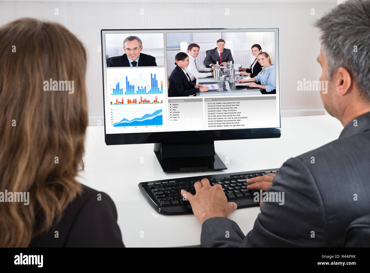 Two Businesspeople Participating In Video Conference Stock Photo - Alamy