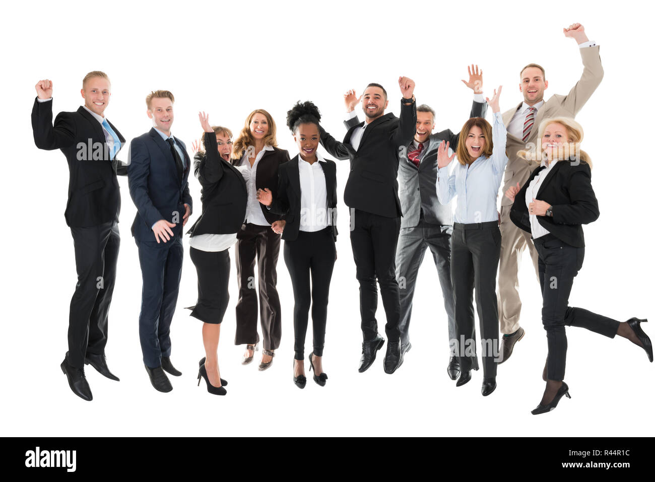 Full Length Of Happy Business Team Celebrating Success Stock Photo - Alamy
