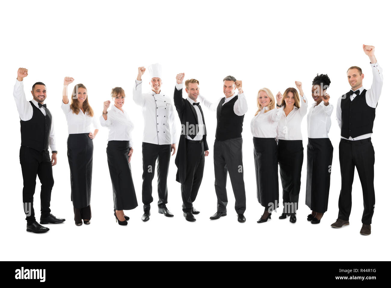Portrait Of Happy Restaurant Staff Celebrating Success Stock Photo