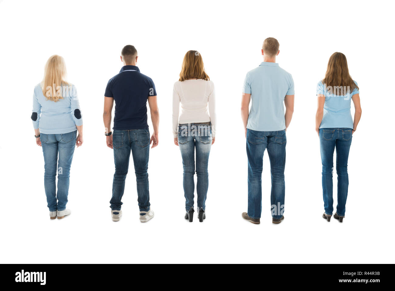 Rear View Of People Standing In Row Stock Photo