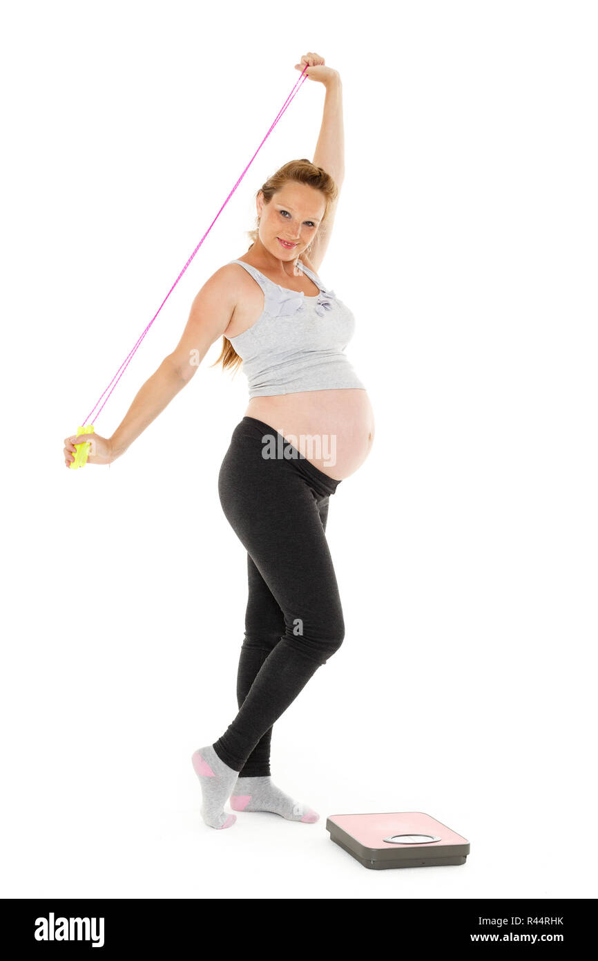 Sports pregnant woman with scales Stock Photo Alamy