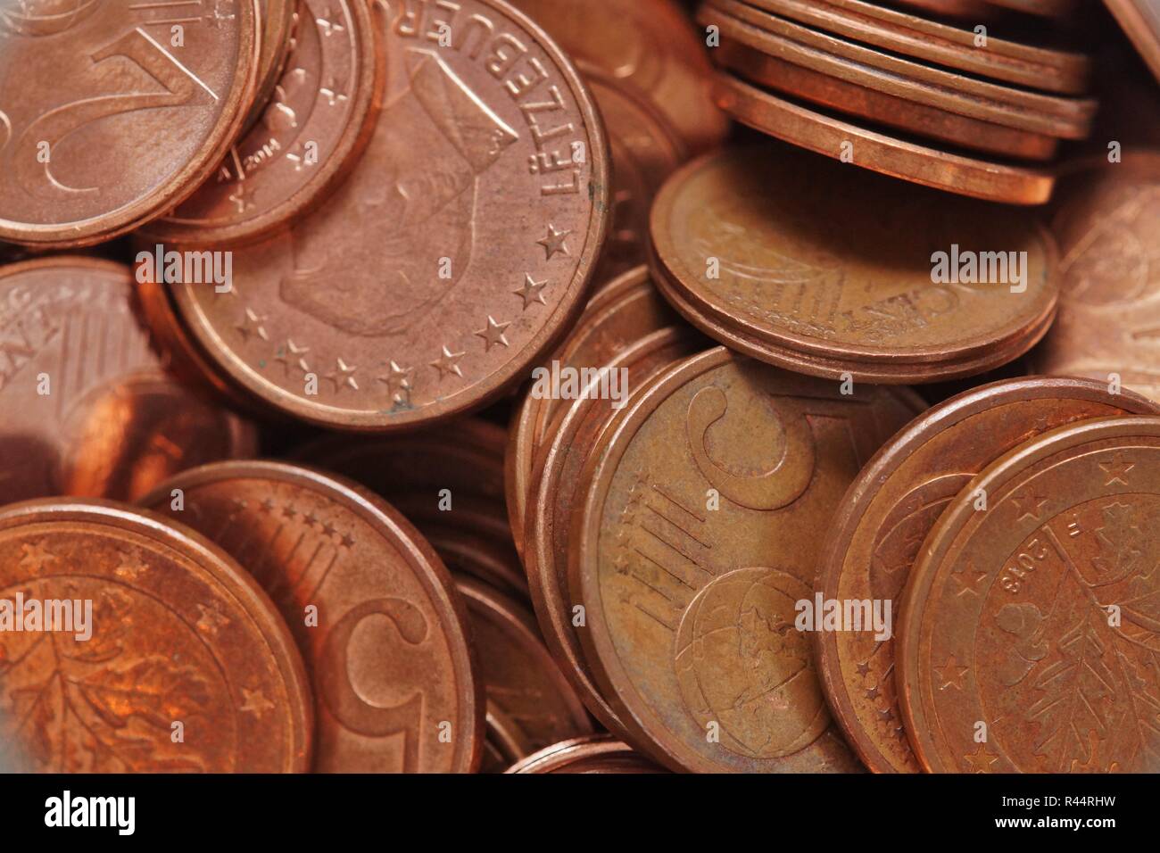 multiple currencies lying on a table Stock Photo