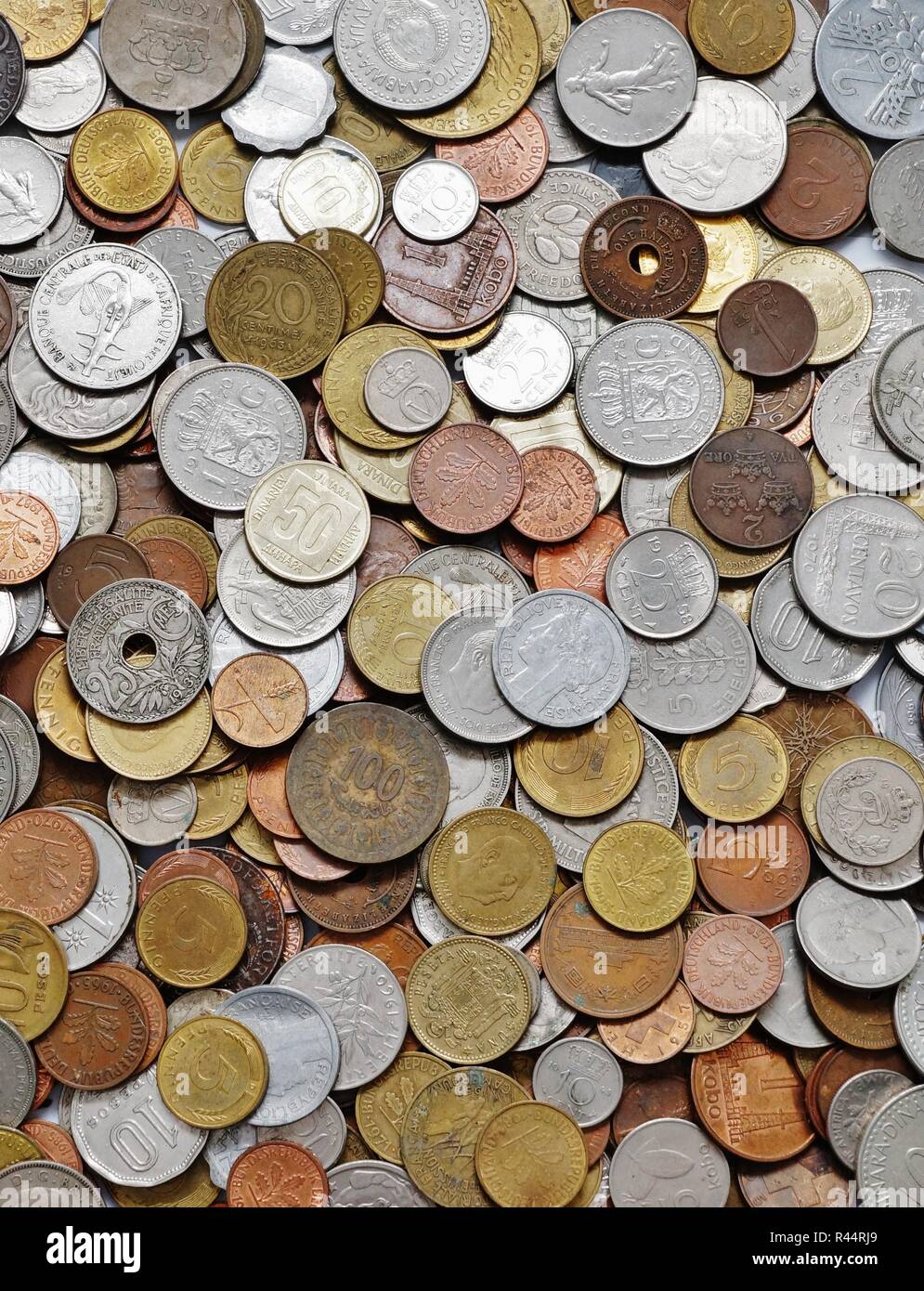 various currencies old lying on a table Stock Photo