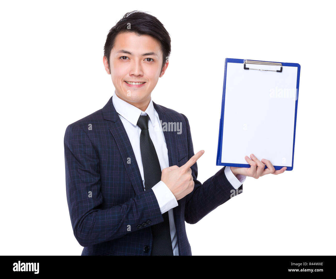 Asian businessman finger point to clipboard Stock Photo - Alamy