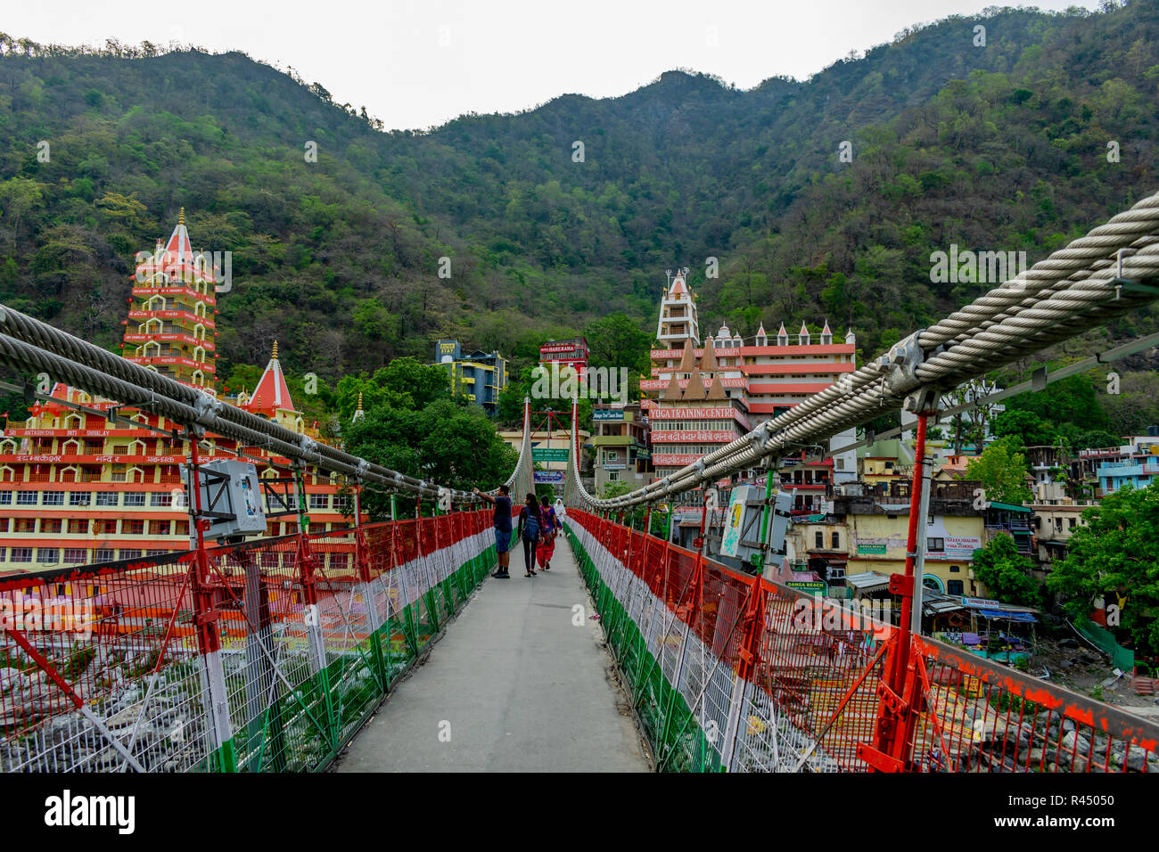 Lakshman Jhula- a suspension bridge in Rishikesh, over the Ganges river Stock Photo