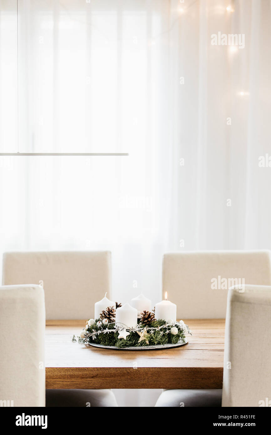 Advent Wreath with four candles. The first candle being lit on the first Sunday in December to