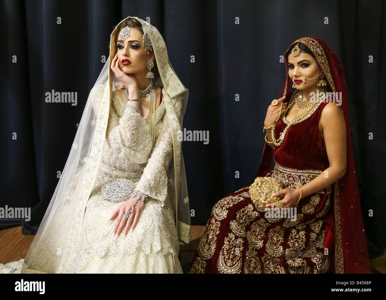 https://c8.alamy.com/comp/R4568P/london-uk-25-november-2018-indian-brides-posing-at-the-asian-wedding-show-2018-showing-the-lovely-colours-of-india-the-jewellery-make-up-and-hair-event-held-at-the-recreation-byron-hall-harrow-london-@paul-quezada-neimanalamy-live-news-R4568P.jpg