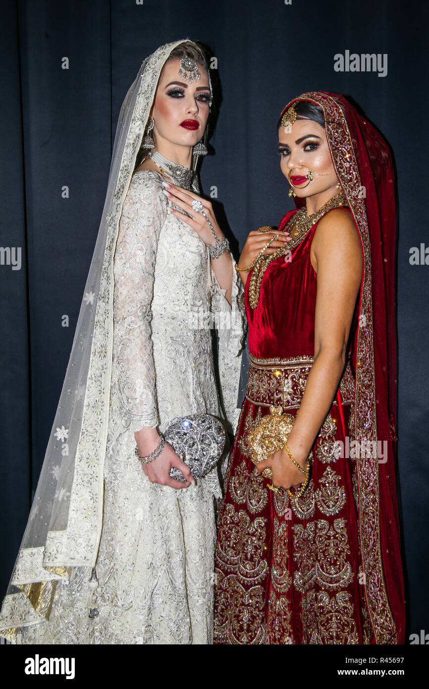 https://c8.alamy.com/comp/R45697/london-uk-25-november-2018-indian-brides-posing-at-the-asian-wedding-show-2018-showing-the-lovely-colours-of-india-the-jewellery-make-up-and-hair-event-held-at-the-recreation-byron-hall-harrow-london-@paul-quezada-neimanalamy-live-news-R45697.jpg