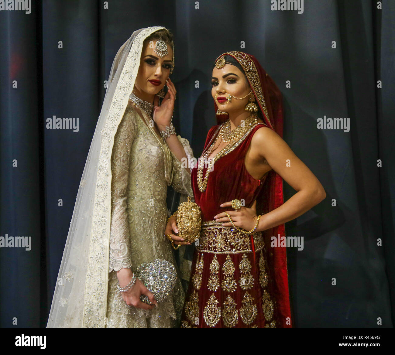 https://c8.alamy.com/comp/R4569G/london-uk-25-november-2018-indian-brides-posing-at-the-asian-wedding-show-2018-showing-the-lovely-colours-of-india-the-jewellery-make-up-and-hair-event-held-at-the-recreation-byron-hall-harrow-london-@paul-quezada-neimanalamy-live-news-R4569G.jpg