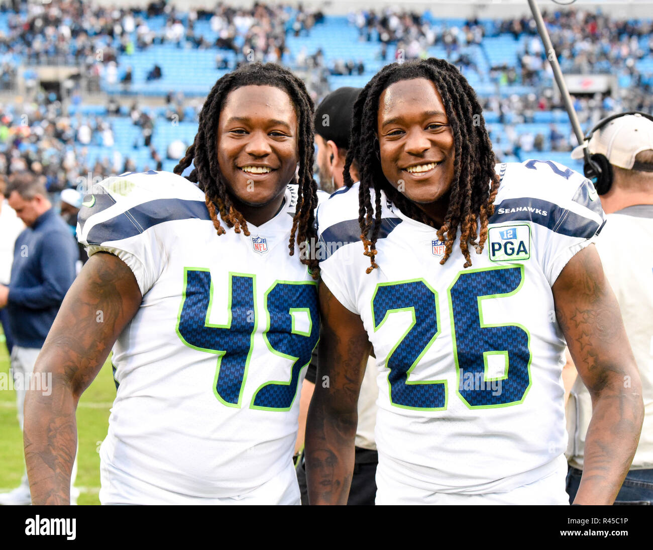 Charlotte, North Carolina, USA. 25th Nov, 2018. Seattle Seahawks Griffin  Twins, linebacker SHAQUEM GRIFFIN (49) and his brother cornerback SHAQUILL  GRIFFIN (26) pose after beating the Carolina Panthers on November 25, 2018