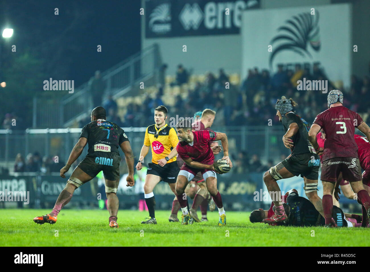 Parma, Italy. 25th November, 2018. Munster's scrum half Conor Murray backs to the field after his injury in the match against Zebre Rugby Club. Here passes the ball to his team mate. ©Massimiliano Carnabuci/Alamy Live news Stock Photo