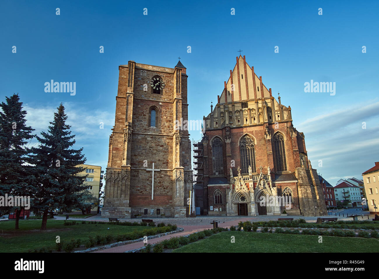facade of a medieval Roman Catholic church in the Gothic style in Nysa Stock Photo