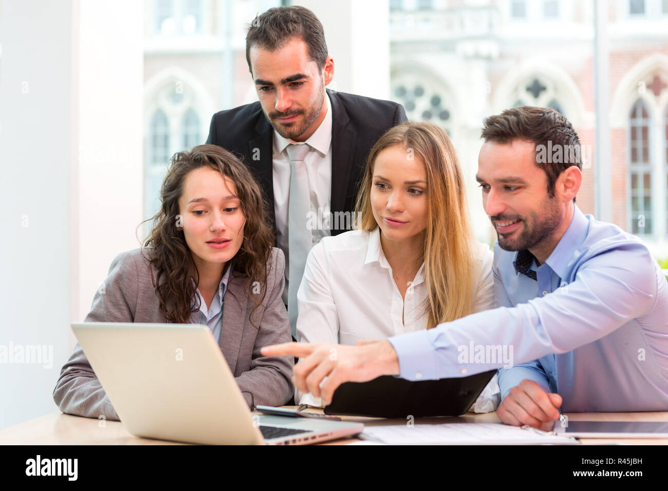 Group of business people working together at the office Stock Photo - Alamy