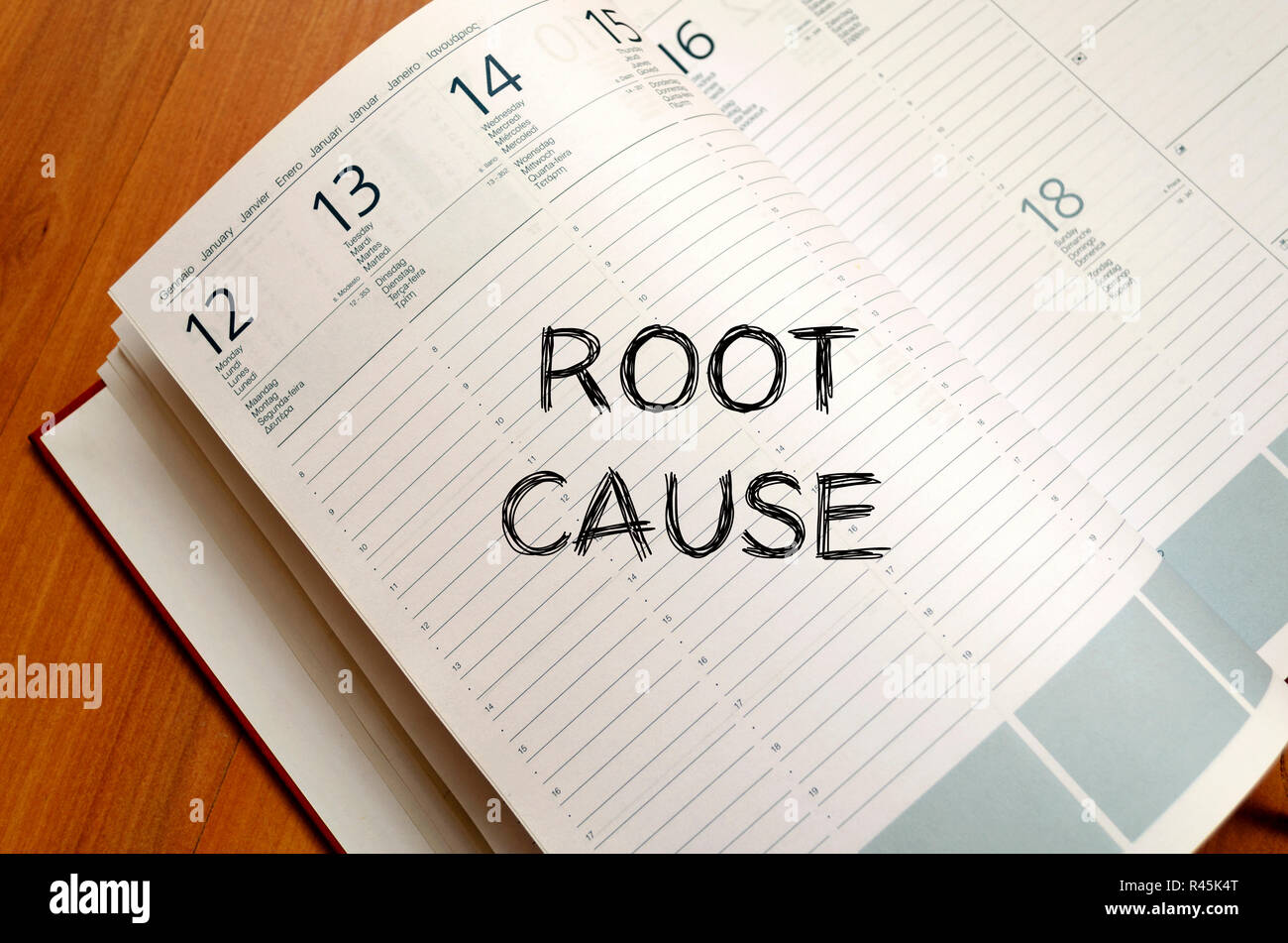 Root cause write on notebook Stock Photo
