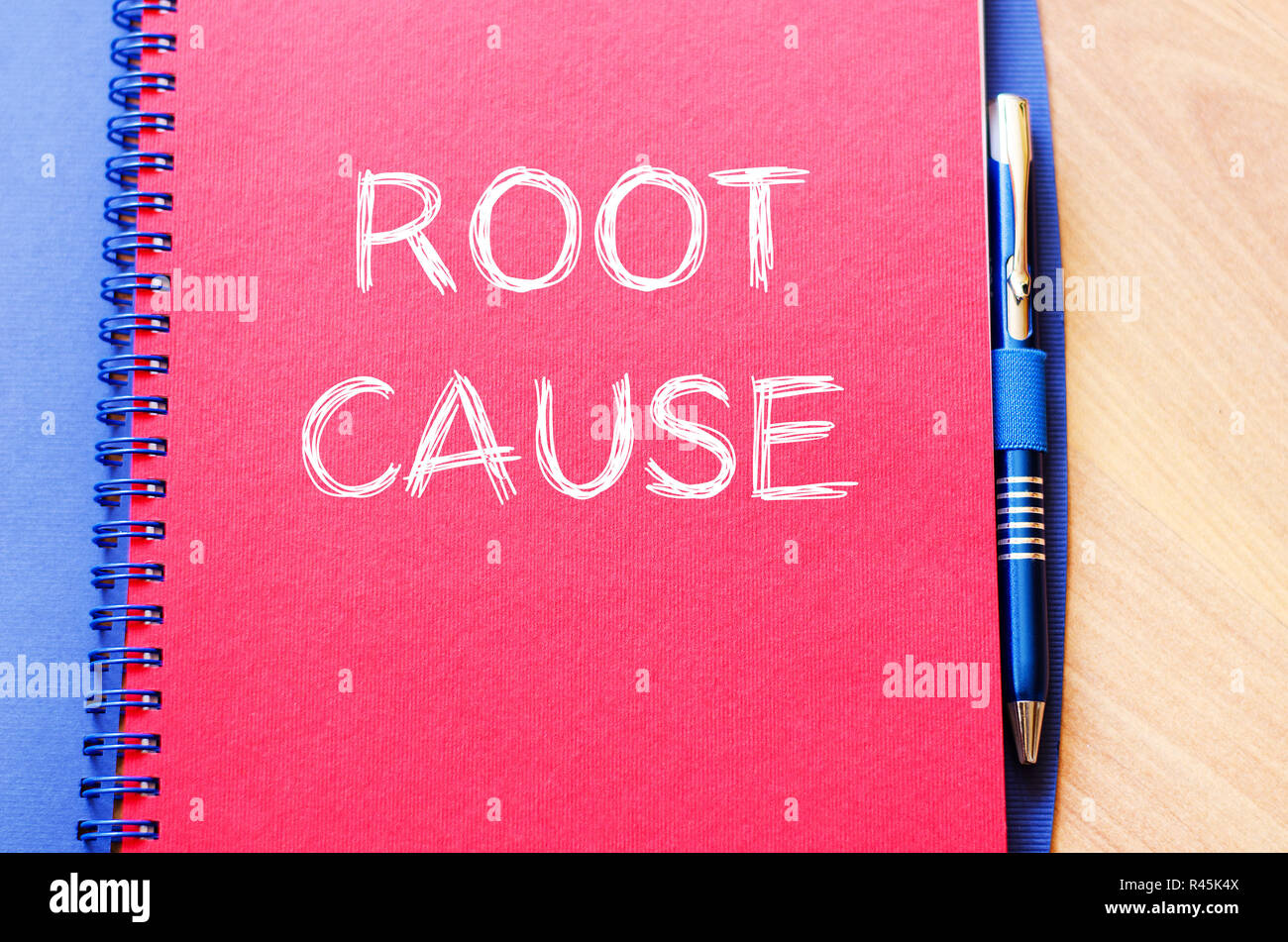 Root cause write on notebook Stock Photo