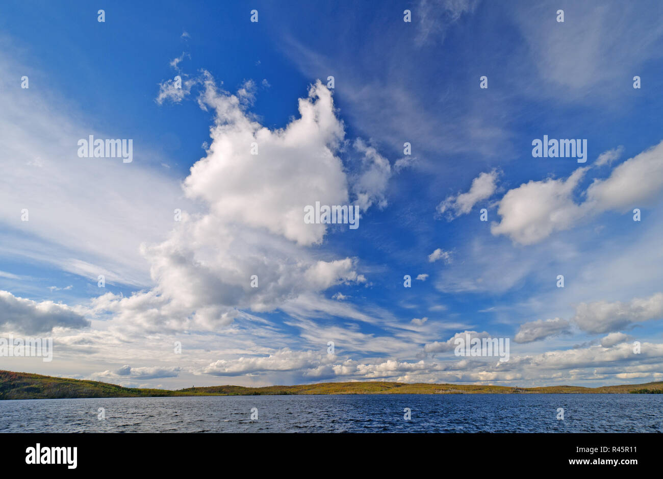 High Clouds over a Remote Lake Stock Photo