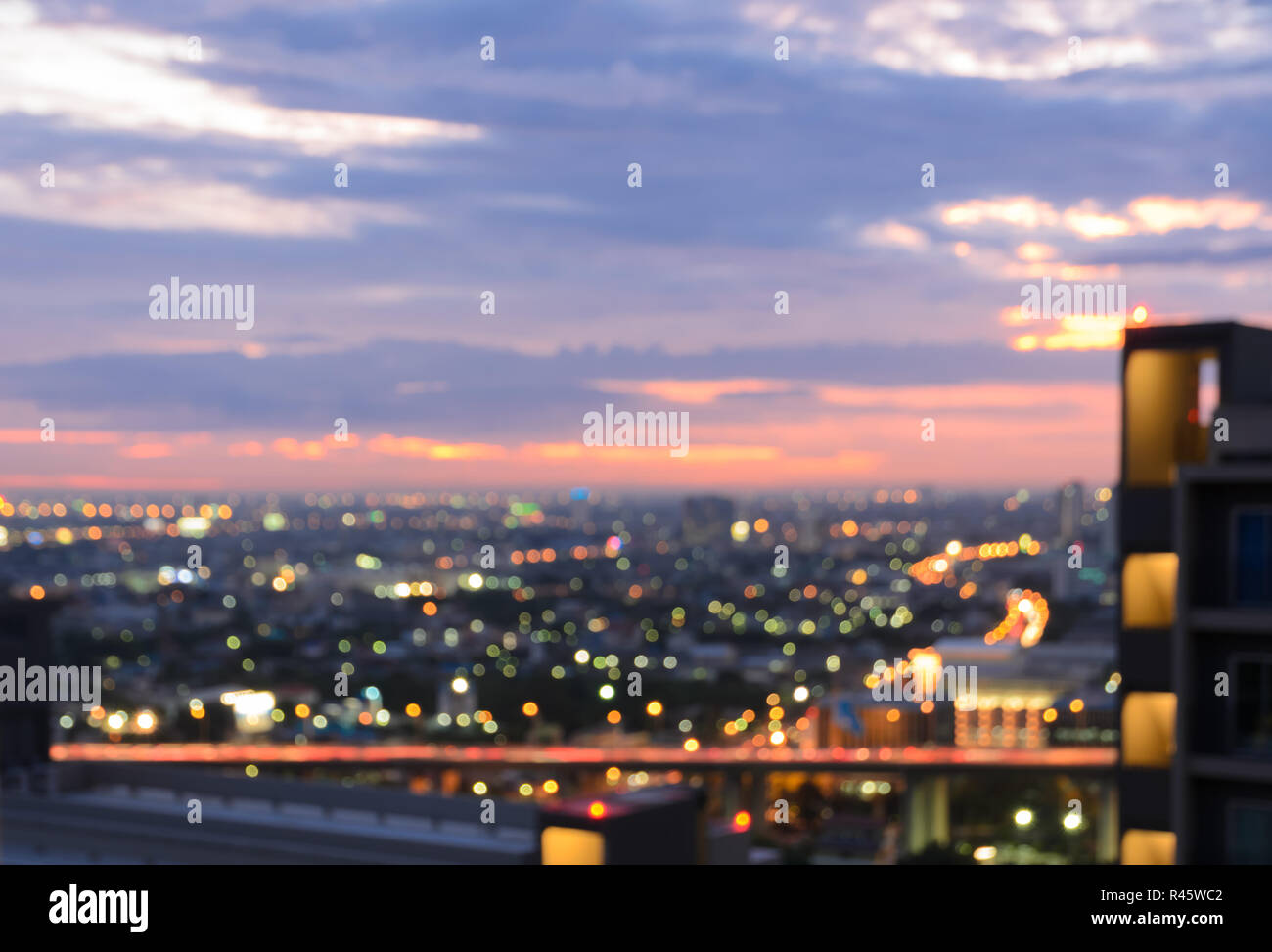 Aerial view of city skyline at twilight. Blur cityscape background ...