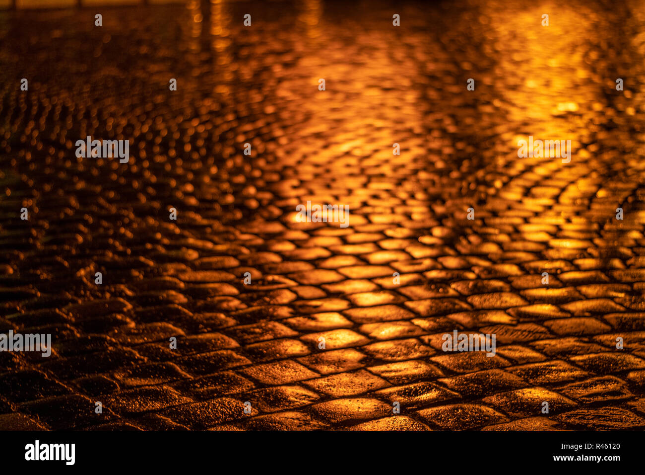 Paving stone vintage road cover. Evening road in a historical place