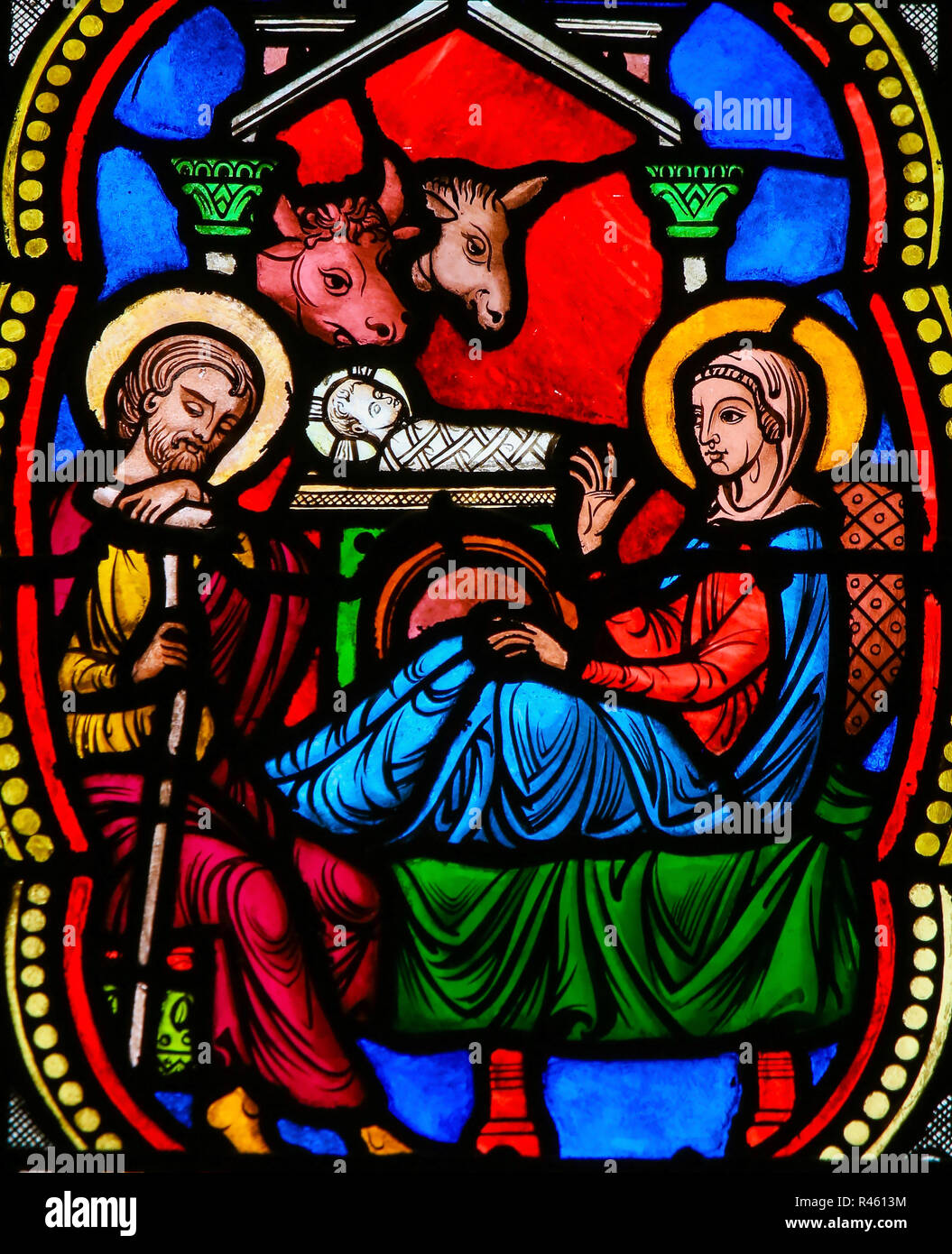 Stained Glass in the Cathedral of Monaco depicting a Nativity Scene at Christmas Stock Photo