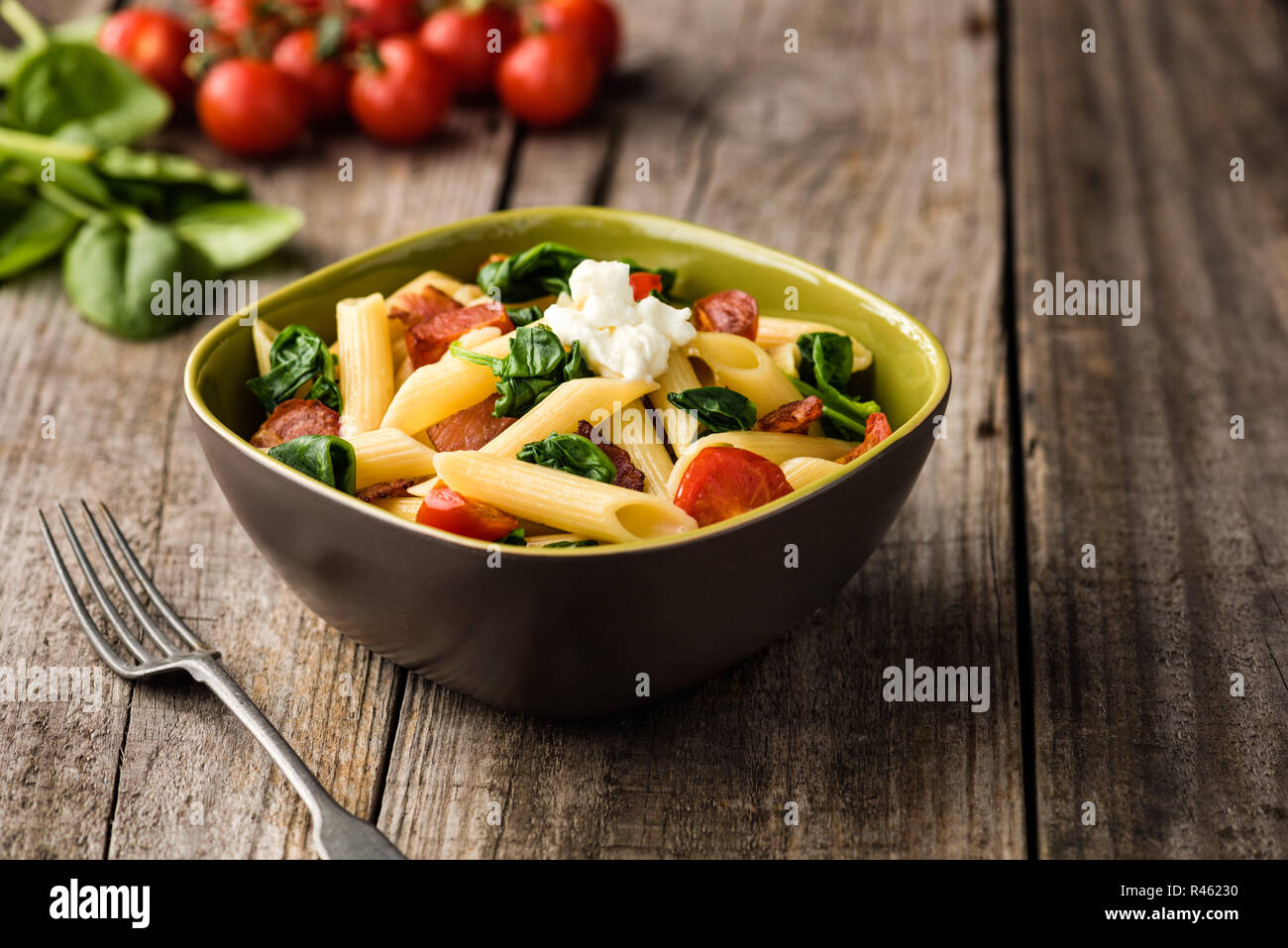 Tomato and Bacon Penne Pasta Stock Photo - Alamy