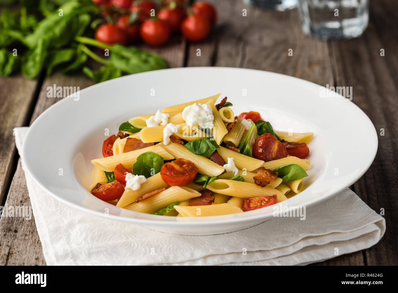 Tomato and Bacon Penne Pasta Stock Photo - Alamy