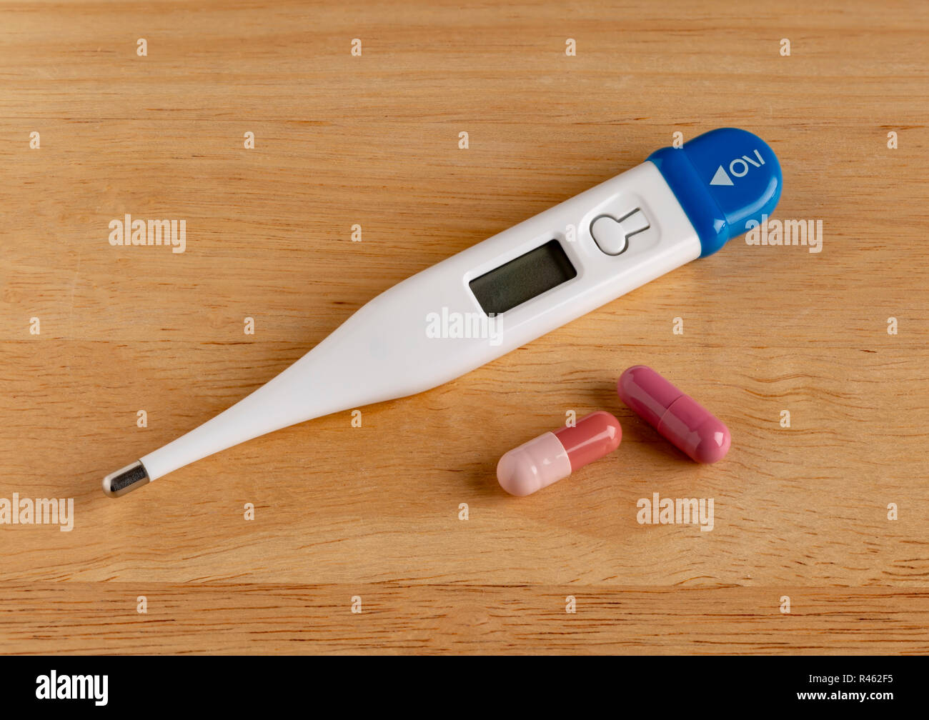 Medical digital thermometer display 38.6 degrees celsius. Traditional