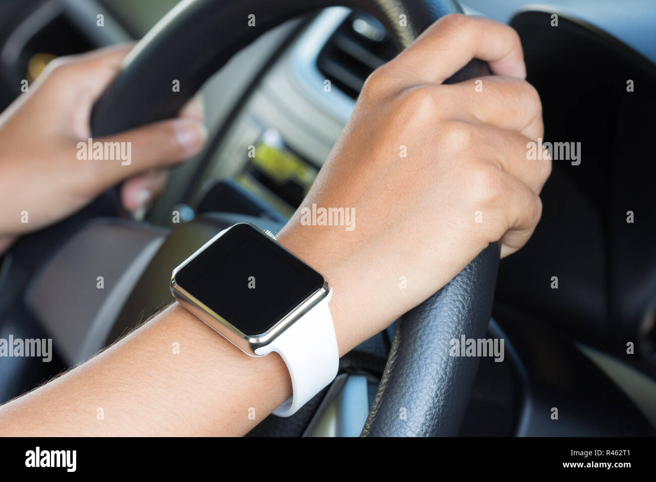 closeup hand wear hand watch diving car Stock Photo