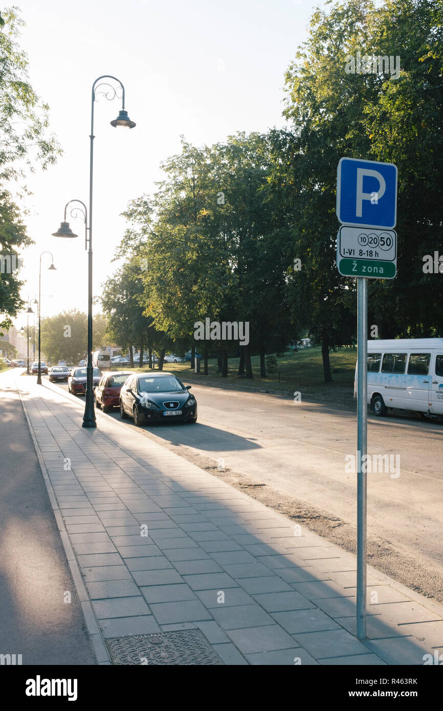 Parked cars in quiet avenue of Vilnius Stock Photo