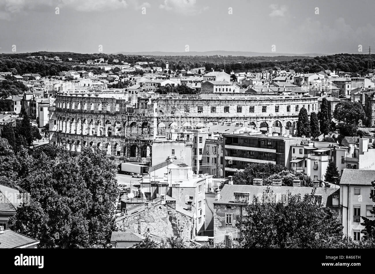 Pula Arena - ancient amphitheater located in Pula, Istria, Croatia. Travel destination. Famous object. Black and white photo. Stock Photo