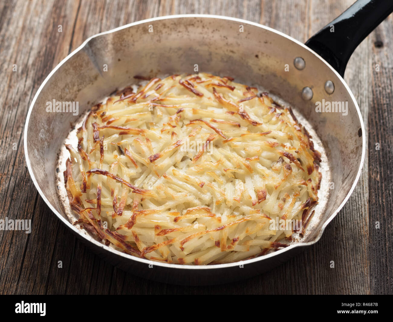 rustic swiss potato rosti Stock Photo - Alamy