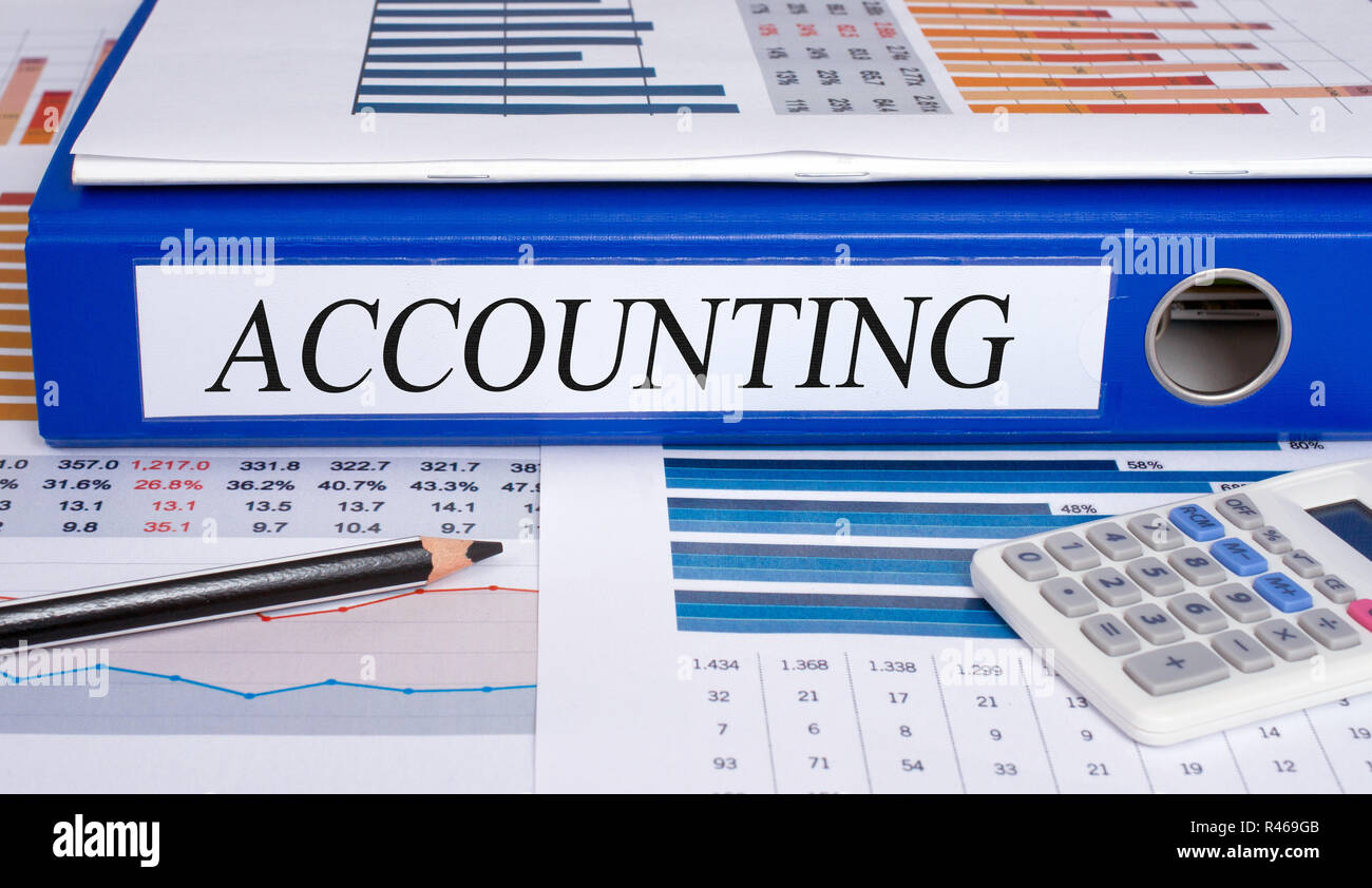 Accounting blue binder in the office Stock Photo Alamy